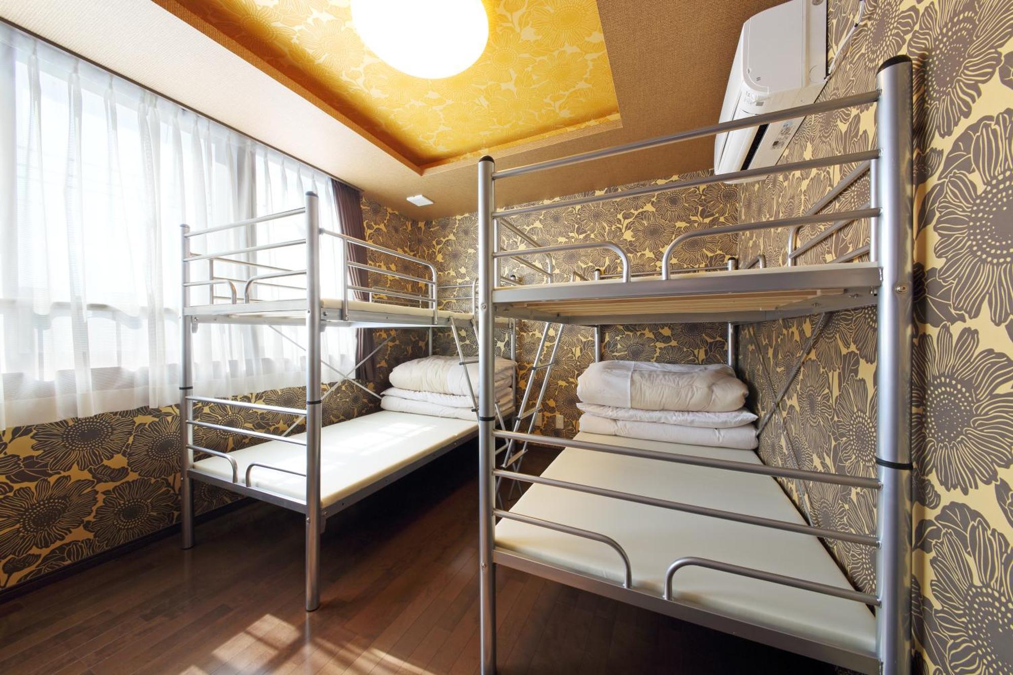 Guesthouse Tiga Кумамото Номер фото
