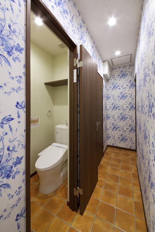 Guesthouse Tiga Кумамото Номер фото