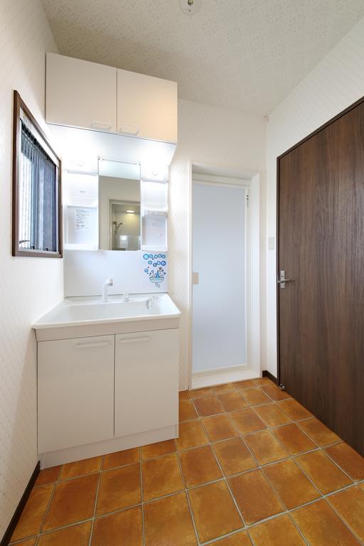 Guesthouse Tiga Кумамото Номер фото